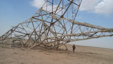 Two people killed, power towers down by IS militants