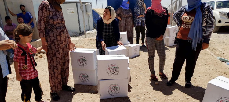 Displaced slam at Baghdad for useless food boxes