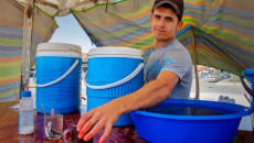 Mohammed Jumma, a fresh juice seller, is proud of his job