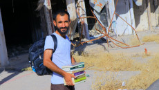 Kameran defies war and destruction by books
