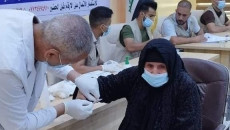 الفريق الوطني يباشر بجمع المعلومات وسحب عينات الدم من ذوي ضحايا "داعش" في تلعفر