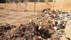 Remains exhumed from Shingal mass grave flattened into car park