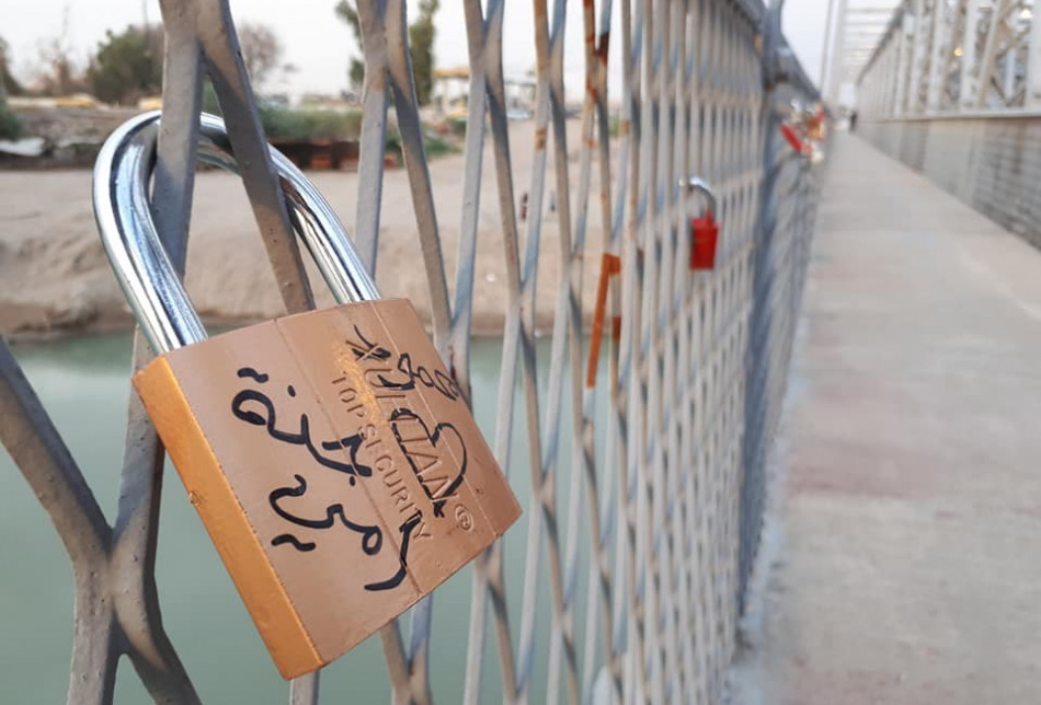 An old bridge in Mosul embraces a new tradition for lovers